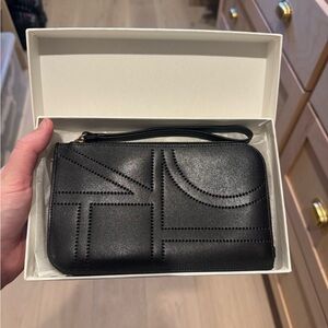 Toteme Monogram Leather Wristlet Pouch